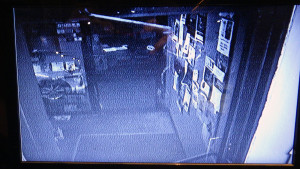Image of the monitor in the KBOO studios which shows the camera in the front of the station.