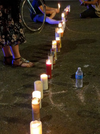 a barricade of lights to answer ICE's street blockage at their dungeon a barricade of lights to answer ICE's street blockage at their dungeon